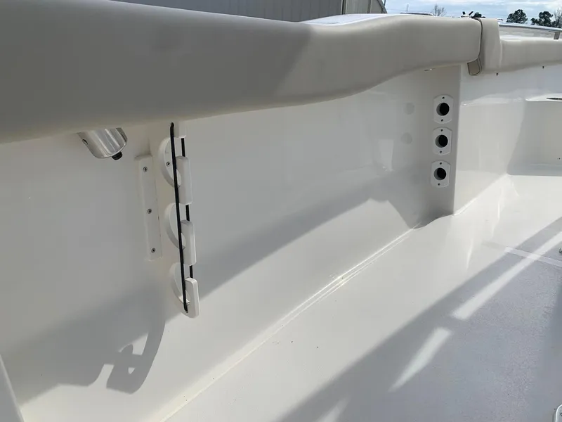 Slide: The Image of 2024 Key West 203 FS boat interior side view with rod holders. - 18