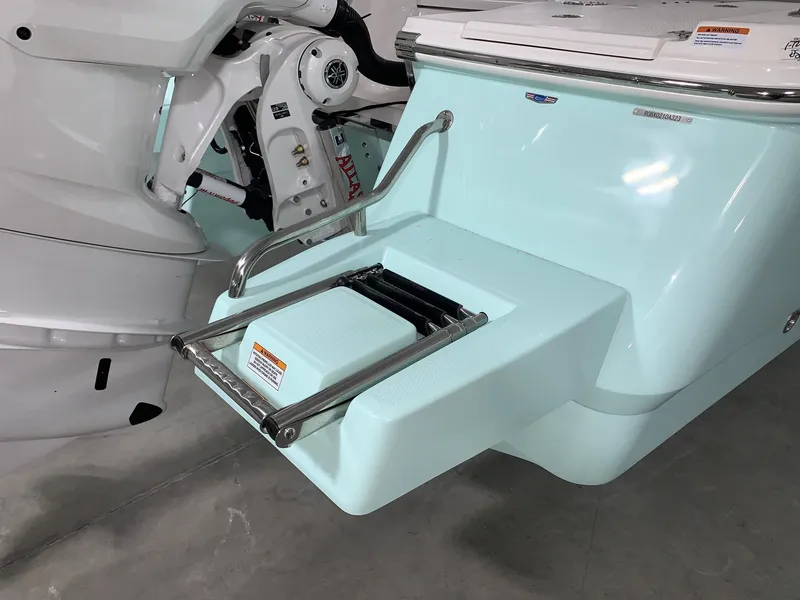 Slide: The Image of 2024 Robalo 266 Cayman swim platform with retractable ladder. - 3