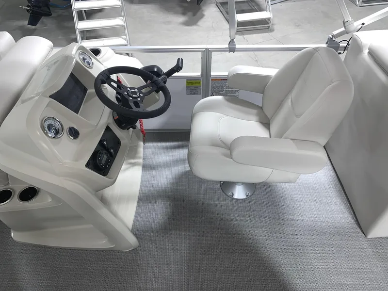 Slide: The Image of Captain's chair and helm of 2024 Starcraft LX22 R pontoon boat. - 8