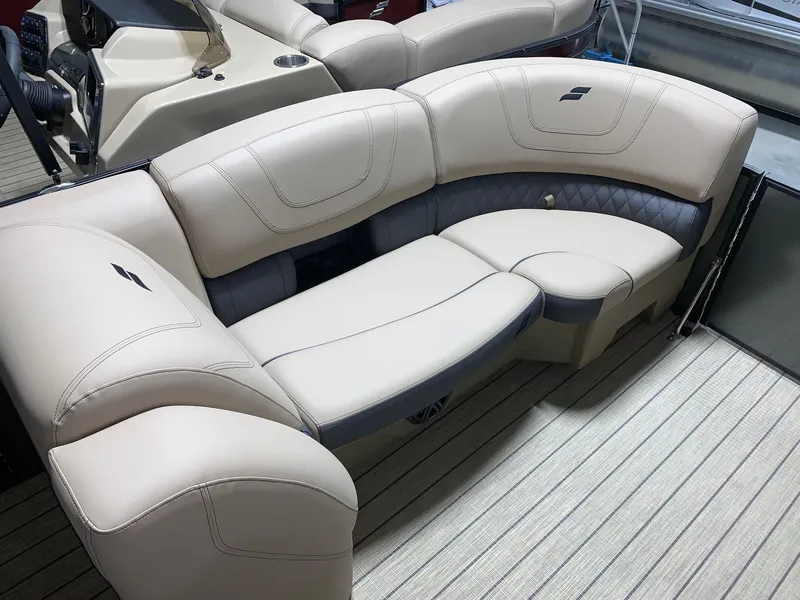 Slide: The Image of 2024 Starcraft SLS 3 boat with luxurious beige seating and modern design. - 10
