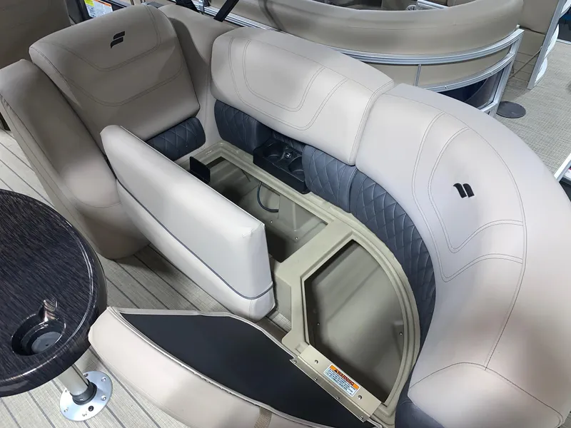 Slide: The Image of 2024 Starcraft SLS 3 boat interior seating with storage compartment. - 4