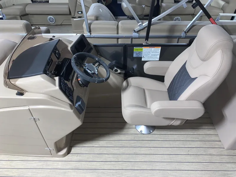 Slide: The Image of 2024 Starcraft SLS 3 boat captain's chair and helm station. - 7