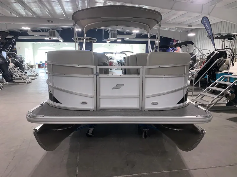 Slide: The Image of 2024 Starcraft LX22 R pontoon boat in showroom. - 3