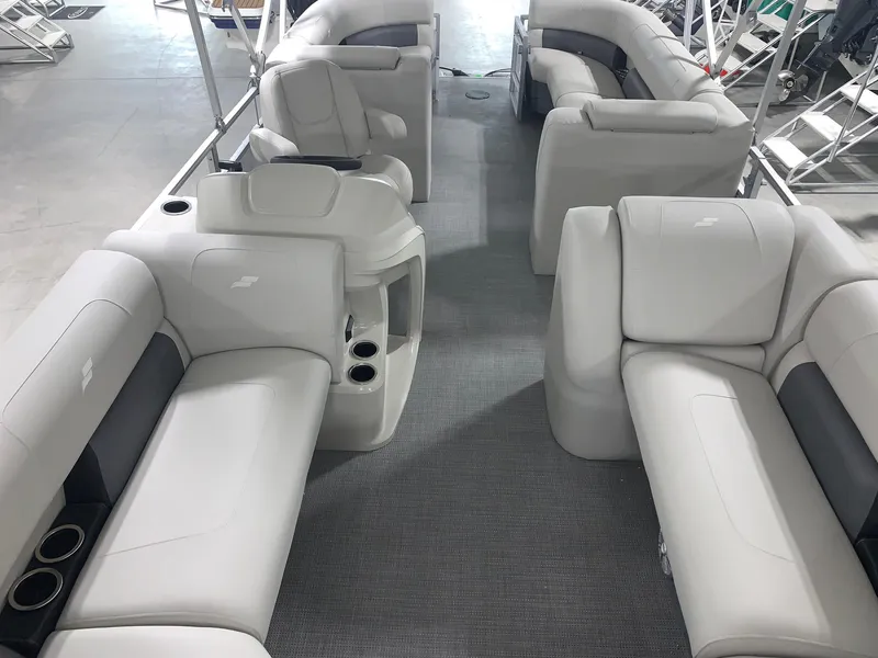 Slide: The Image of 2024 Starcraft LX22 R pontoon boat interior with luxurious seating and modern design. - 4
