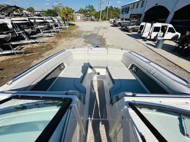 Slide: The Image of 2021 Sea Ray 270 SDX boat interior at a dealership. - 24