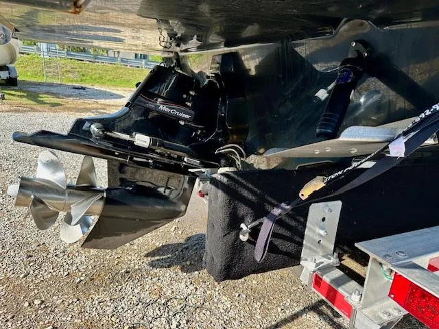 Slide: The Image of 2021 Sea Ray 270 SDX boat with MerCruiser engine and propeller on trailer. - 5