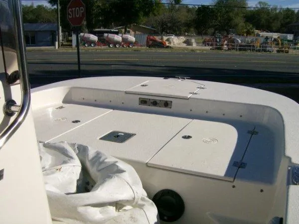 Slide: The Image of 2021 Carolina Skiff 17 LS boat interior with storage compartments. - 4