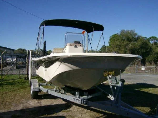 Slide: The Image of 2021 Carolina Skiff 17 LS boat on trailer with canopy. - 5