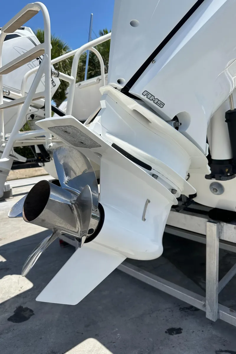Slide: The Image of Close-up of a 2021 World Cat 400 DC-X boat's outboard motor propeller. - 10