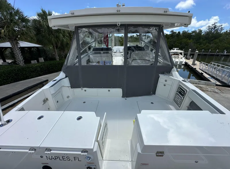 Slide: The Image of 2021 World Cat 400 DC-X boat docked in Naples, FL. - 11