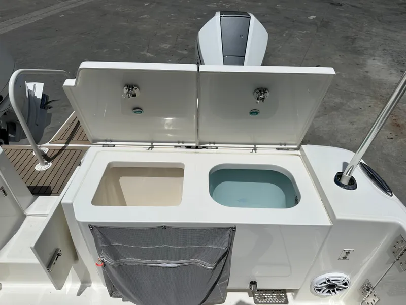 Slide: The Image of 2021 World Cat 400 DC-X boat with dual sink compartments. - 17