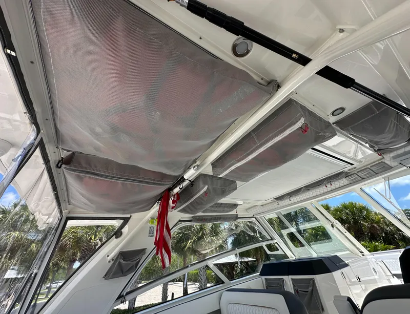 Slide: The Image of Interior view of 2021 World Cat 400 DC-X boat with mesh storage compartments. - 27