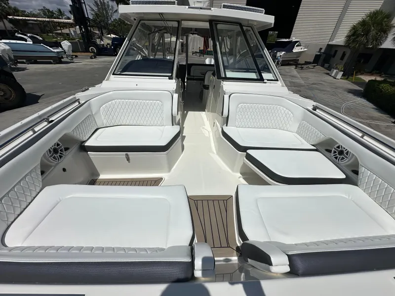 Slide: The Image of 2021 World Cat 400 DC-X boat with spacious seating and modern design. - 35