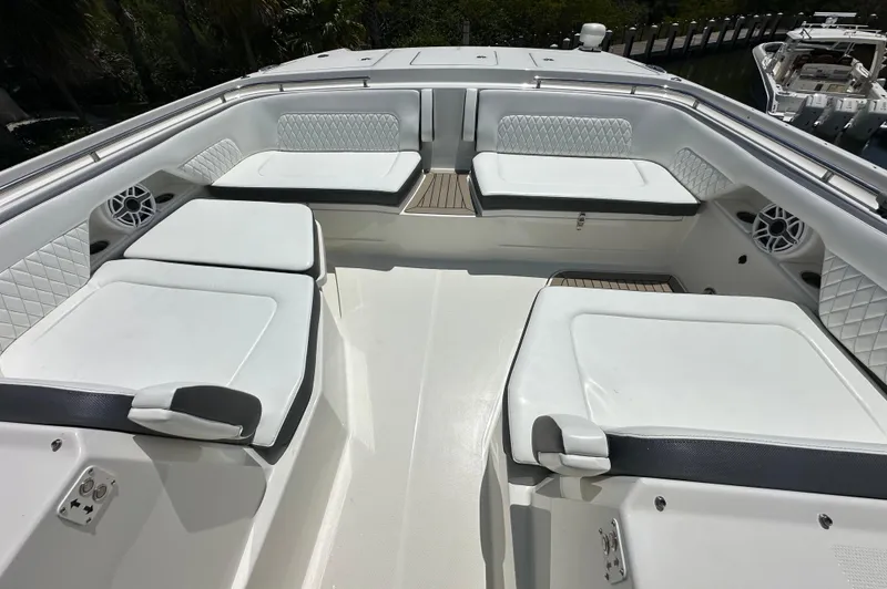 Slide: The Image of Spacious seating area on a 2021 World Cat 400 DC-X boat. - 36