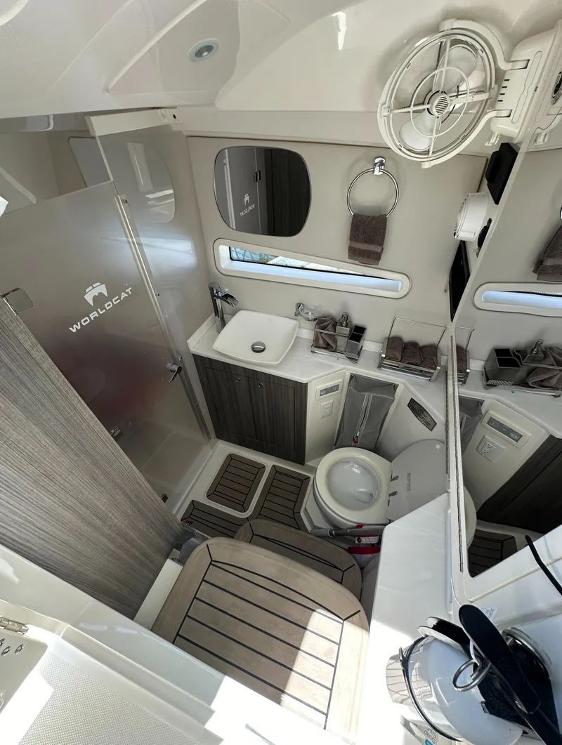Slide: The Image of Luxurious bathroom in 2021 World Cat 400 DC-X boat with modern amenities. - 38