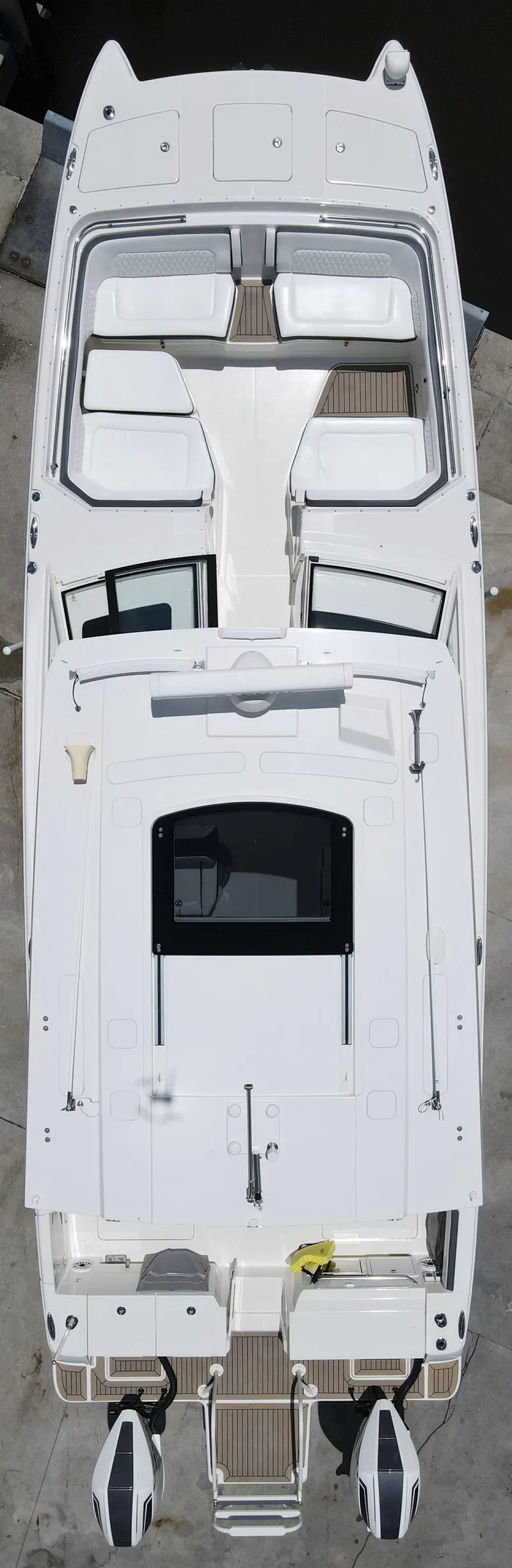 Slide: The Image of Aerial view of a 2021 World Cat 400 DC-X boat docked. - 6