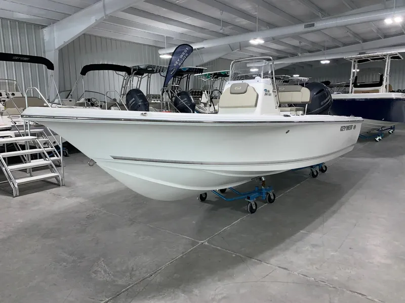 Slide: The Image of 2024 Key West 188 Bay Reef boat in showroom. - 1