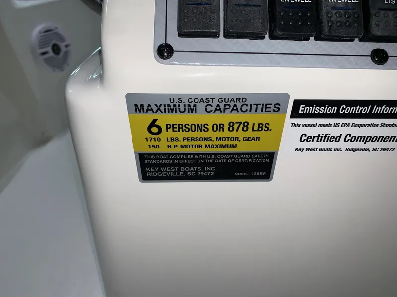 Slide: The Image of 2024 Key West 188 Bay Reef boat capacity label showing maximum capacities. - 13