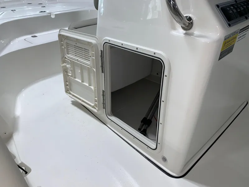 Slide: The Image of 2024 Key West 188 Bay Reef boat storage compartment with open hatch. - 5