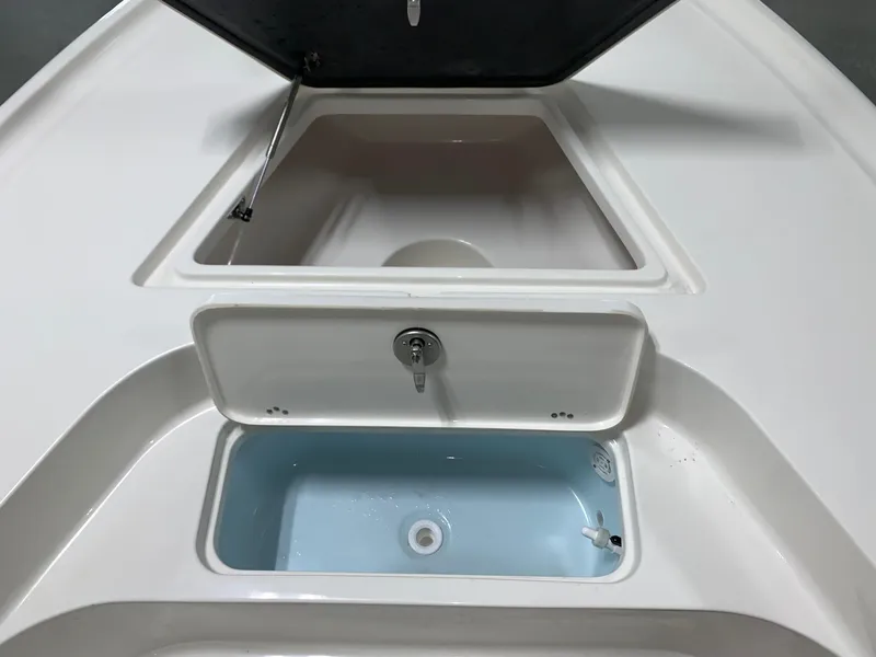 Slide: The Image of 2024 Key West 188 Bay Reef boat storage compartments and livewell. - 9