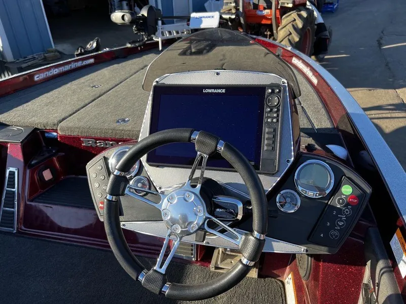 Slide: The Image of 2018 Ranger Z519C boat dashboard with Lowrance fishfinder and steering wheel. - 11