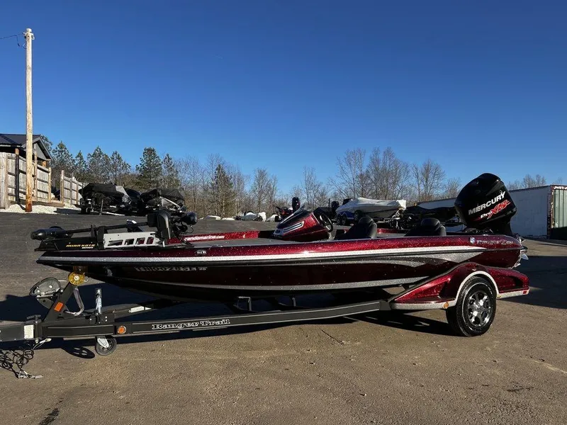 Slide: The Image of 2018 Ranger Z519C bass boat on trailer in outdoor setting. - 7