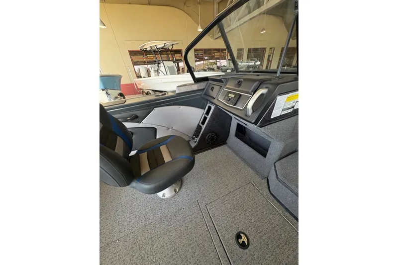 Slide: The Image of 2023 Ranger VX1788 WT boat interior with dual seats and modern dashboard. - 21