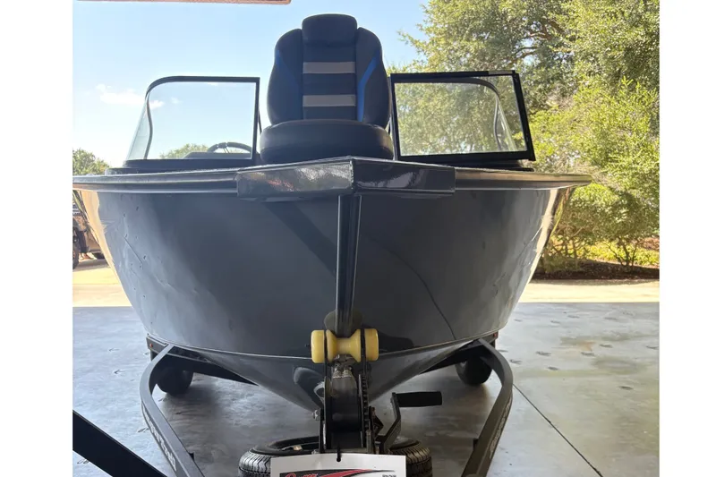 The Image of 2023 Ranger VX1788 WT boat on trailer, displayed for sale with price tag. - 0