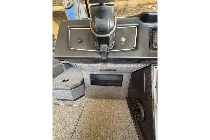 Slide: The Image of 2023 Ranger VX1788 WT boat interior dashboard with control panel and speaker. - 20