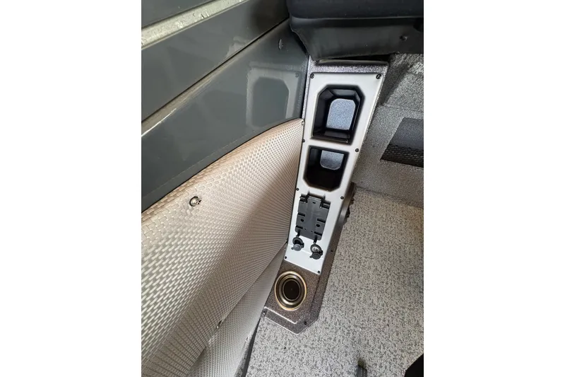 Slide: The Image of Interior view of 2023 Ranger VX1788 WT boat, featuring storage compartments and textured flooring. - 24