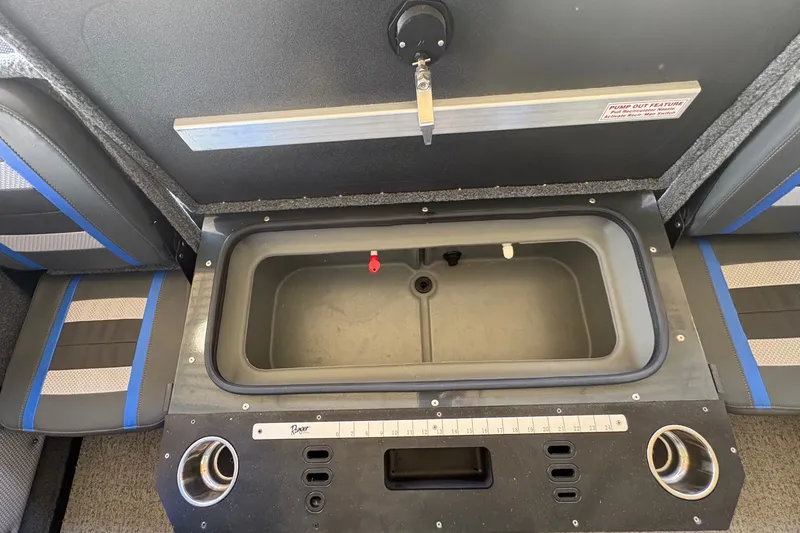 Slide: The Image of 2023 Ranger VX1788 WT boat interior with storage compartment and cup holders. - 29