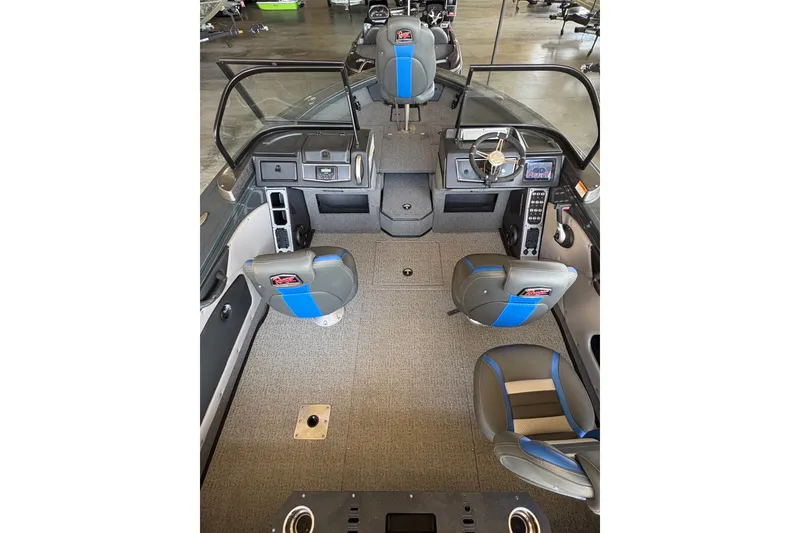 Slide: The Image of 2023 Ranger VX1788 WT boat interior with modern seating and steering console. - 8