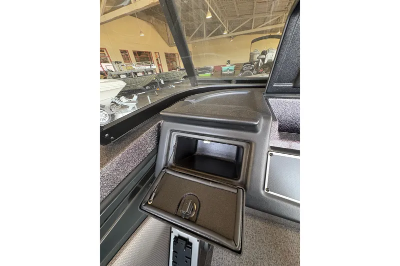Slide: The Image of 2023 Ranger VX1788 WT boat interior with open storage compartment. - 23