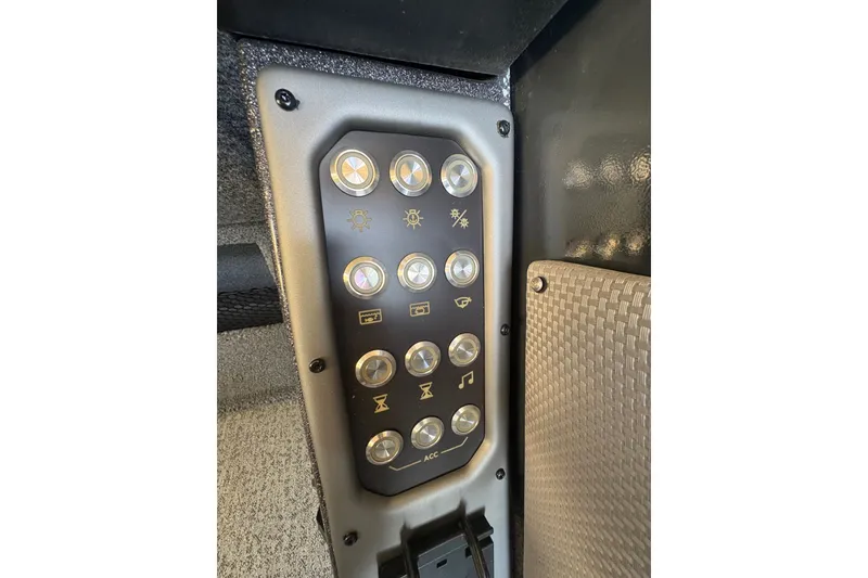 Slide: The Image of Control panel of 2023 Ranger VX1788 WT boat with various function buttons. - 19