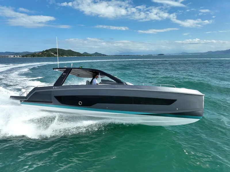 The Image of Schaefer V44 2025 luxury yacht cruising on open water under a clear sky. - 0