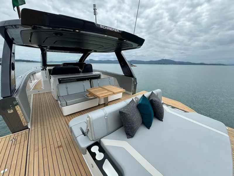 Slide: The Image of Luxury Schaefer V44 yacht 2025 model with spacious deck and modern seating. - 13