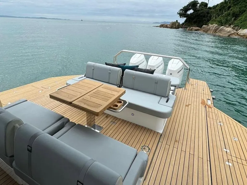Slide: The Image of Luxury Schaefer V44 yacht 2025 model with spacious deck and seating area. - 14