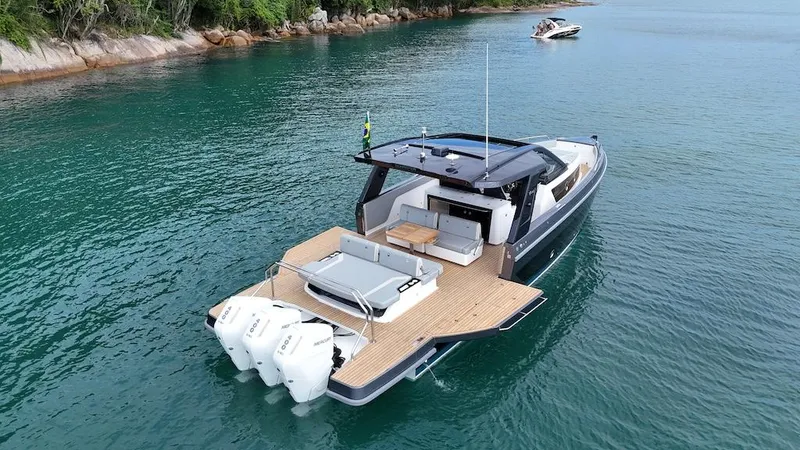 Slide: The Image of 2025 Schaefer V44 luxury yacht on serene water. - 17