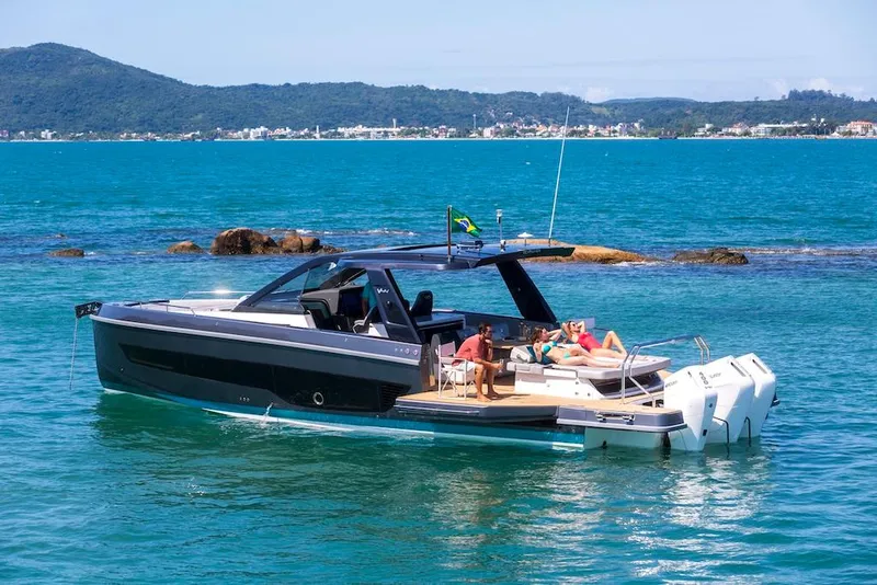 Slide: The Image of Luxury Schaefer V44 yacht cruising in turquoise waters, 2025 model. - 9