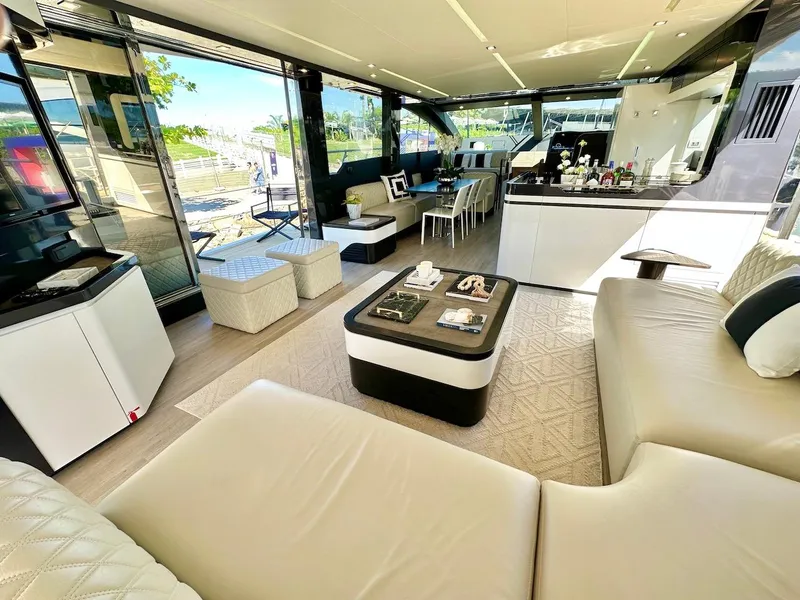 Slide: The Image of Luxurious interior of 2025 Schaefer 770 yacht with modern furnishings and ample natural light. - 17