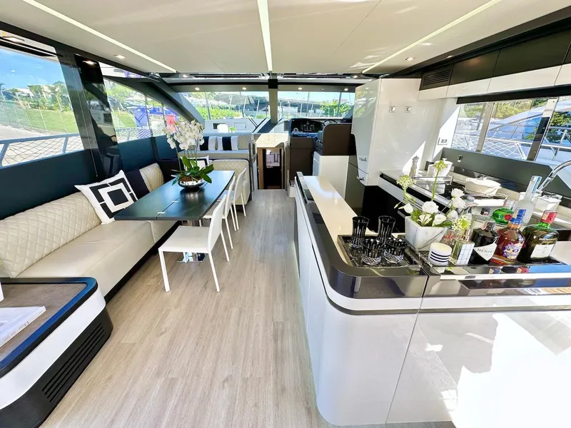 Slide: The Image of Luxurious interior of 2025 Schaefer 770 yacht with modern kitchen and dining area. - 19