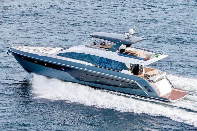 Slide: The Image of Luxury Schaefer 770 yacht cruising on the ocean, 2025 model. - 2