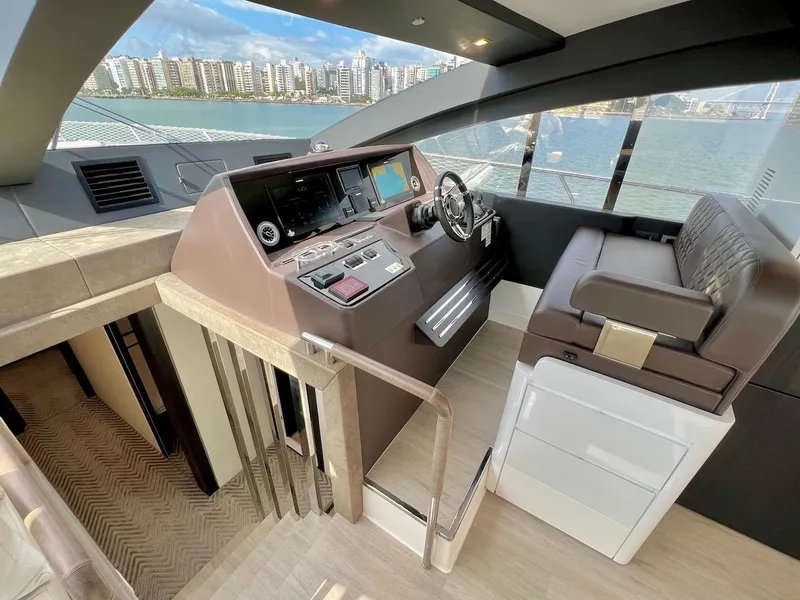 Slide: The Image of Modern Schaefer 770 yacht cockpit with city skyline view, 2025 model. - 26