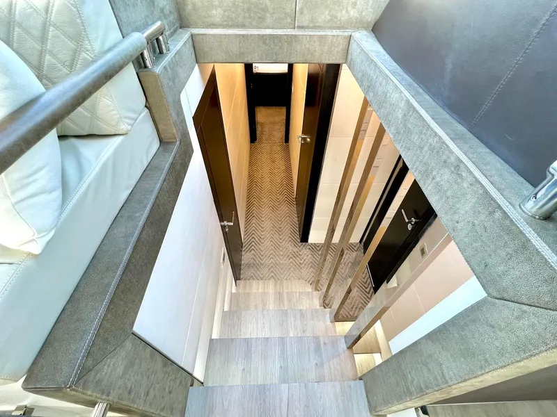 Slide: The Image of Modern interior of Schaefer 770 yacht, 2025 model, featuring sleek stairs and luxurious design. - 29