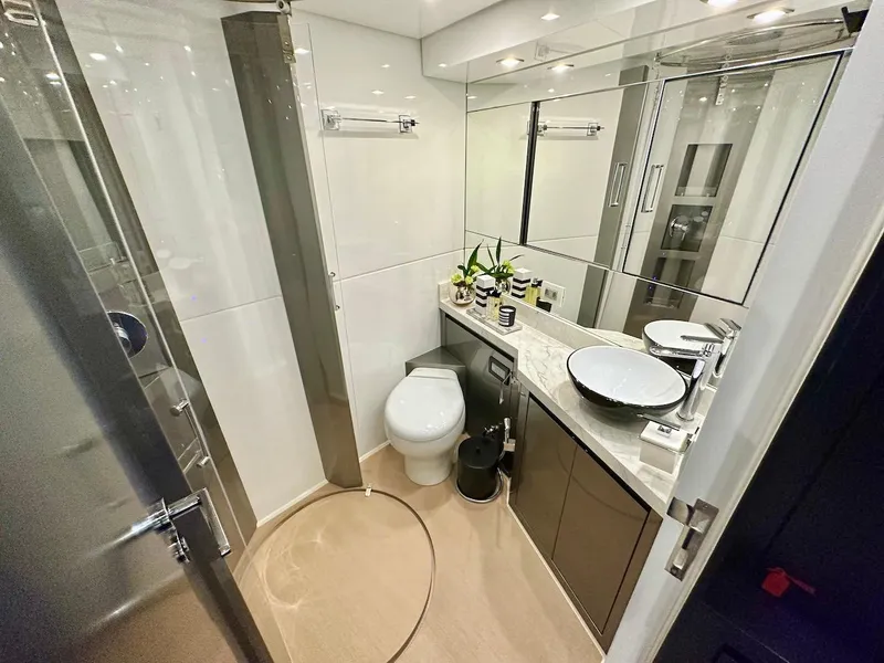 Slide: The Image of Modern bathroom in 2025 Schaefer 770 yacht with sleek design and marble countertop. - 32