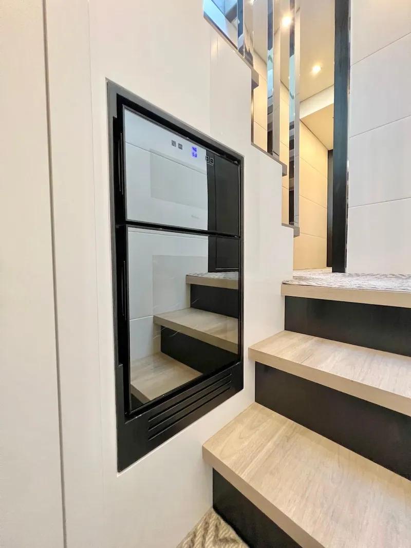 Slide: The Image of Built-in Schaefer 770 appliance, 2025 model, installed beside modern staircase. - 43