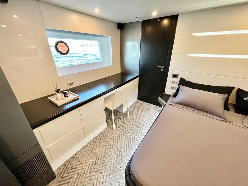 Slide: The Image of Modern Schaefer 770 yacht bedroom, 2025 model, featuring sleek design, large window, and elegant furnishings. - 45