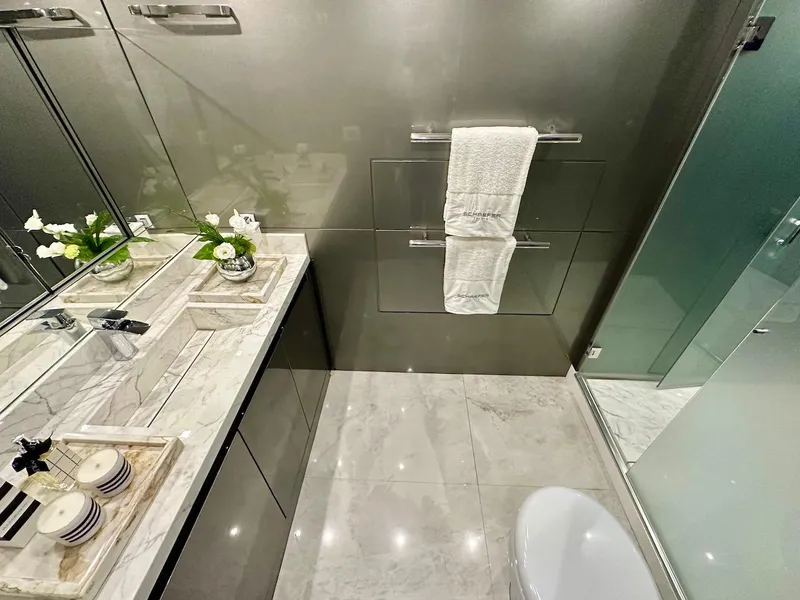 Slide: The Image of Modern bathroom in Schaefer 770 yacht, 2025 model, featuring marble countertops and sleek design. - 47