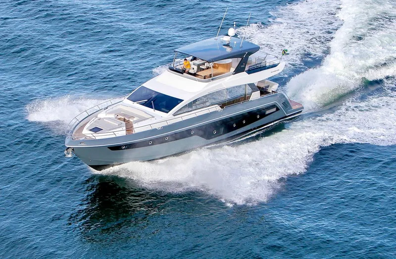 Slide: The Image of 2025 Schaefer 770 yacht cruising on open water. - 5