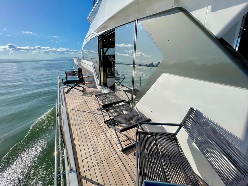 Slide: The Image of Luxury Schaefer 770 yacht deck with ocean view, 2025 model. - 7